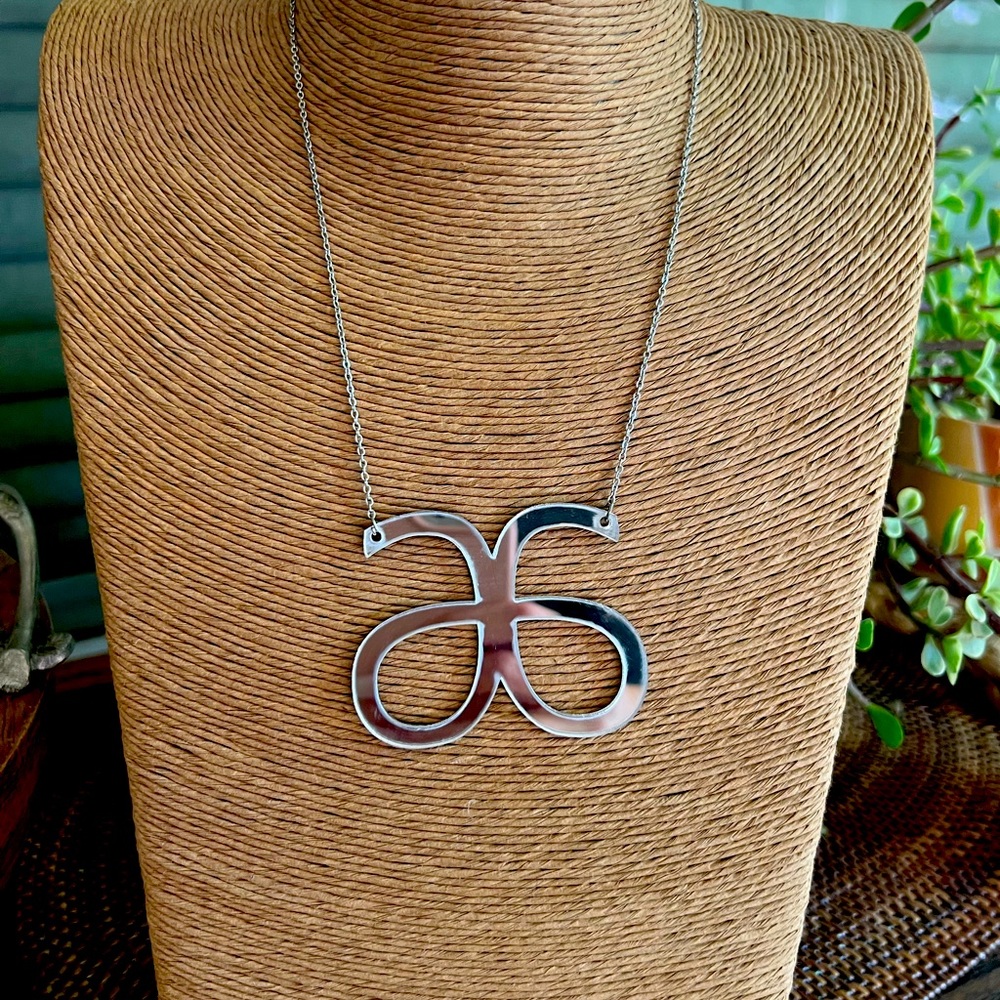 2.5x2 inch silver necklace. 18.5 silver chain.
